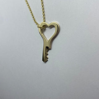 14 carat yellow gold Heart key with padlock