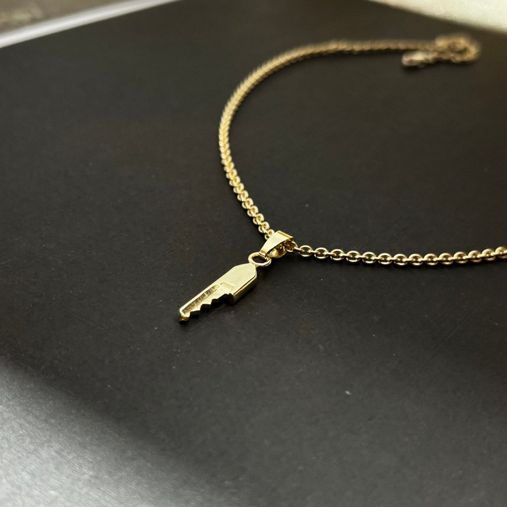 The Key | yellow gold chastity key | chastity shop | chastitykey ...