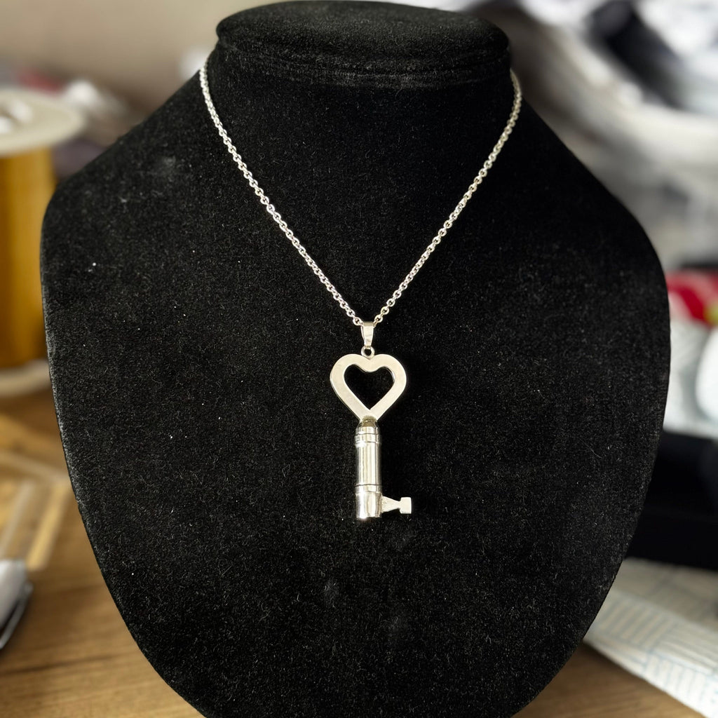 The Secret handmade silver chastity key | chastity-shop