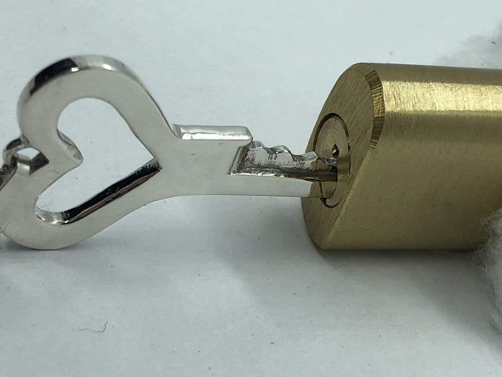 
                  
                    chastity-shop Keys with padlock Open your Heart chastity key with padlock
                  
                